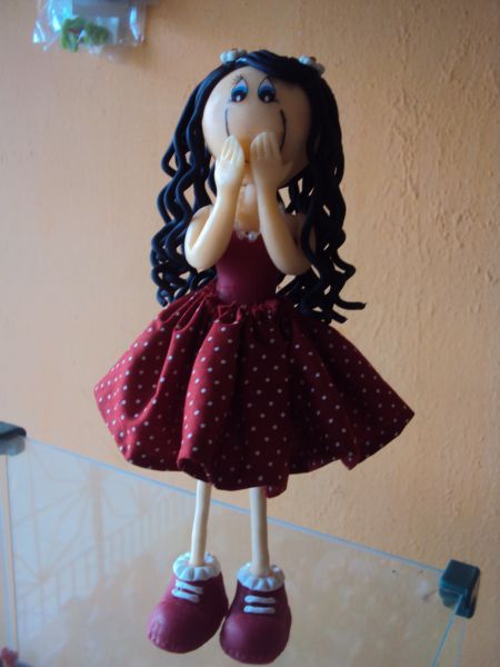 Boneca magrela de biscuit